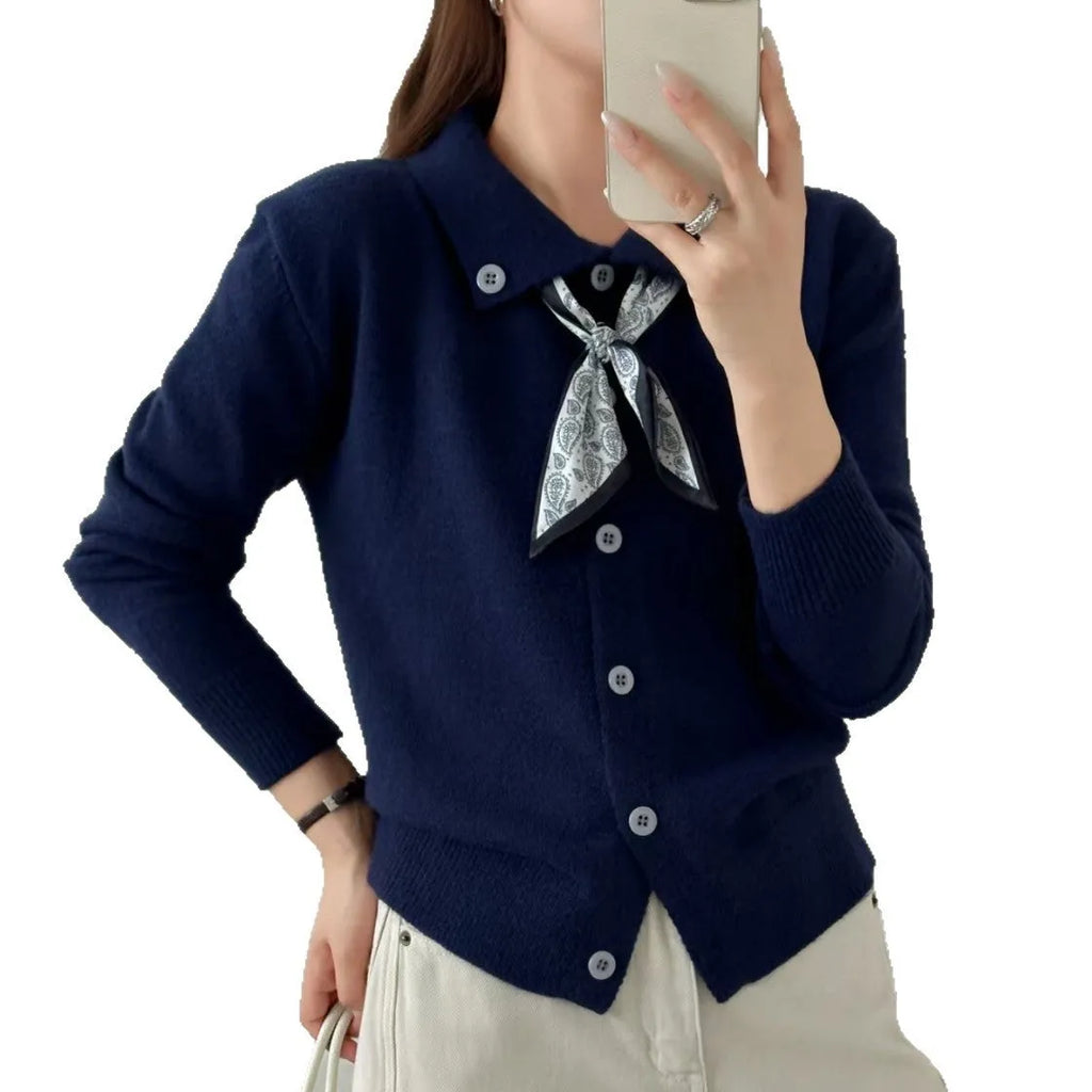 Beige lapel scarf cardigan sweater with long sleeves and splicing details on a model.