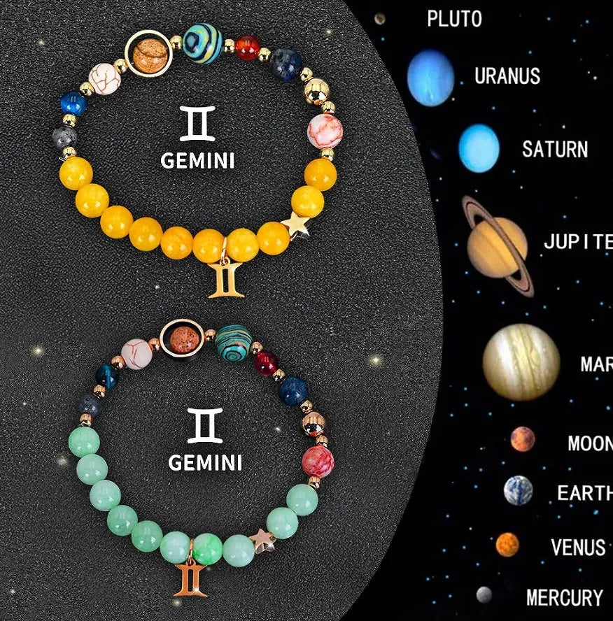 Two natural stone beaded bracelets for zodiac signs on a neutral background.