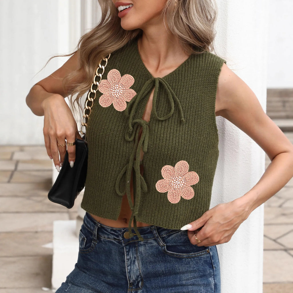 Ladies sleeveless cardigan vest with lace-up bow detail in deer plush polyester fabric with flower pattern