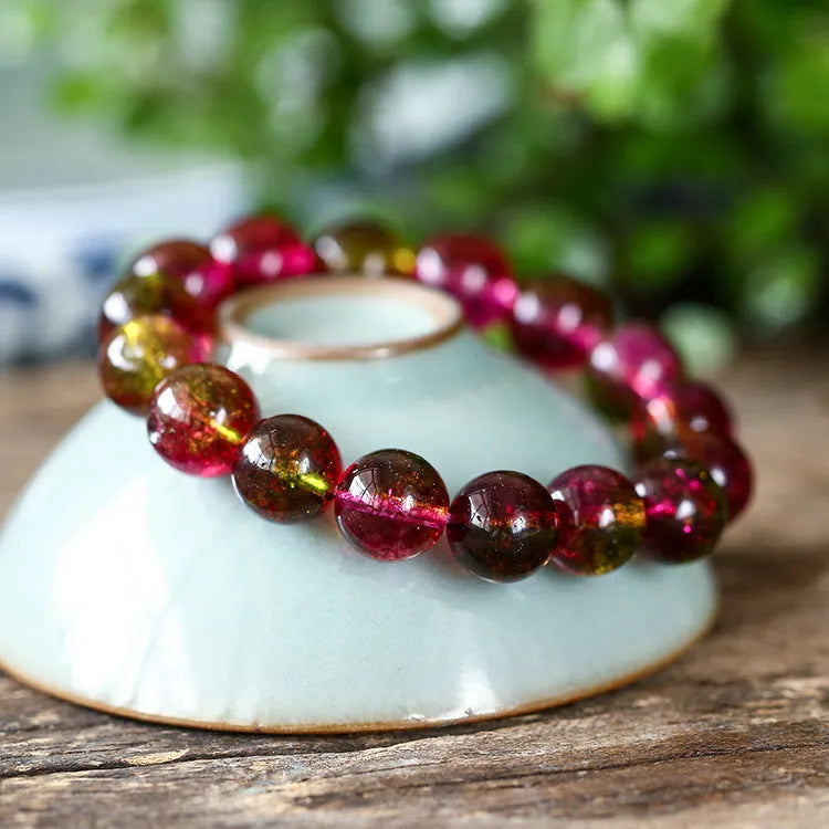 Handcrafted watermelon crystal bracelet for women showing different bead size options.