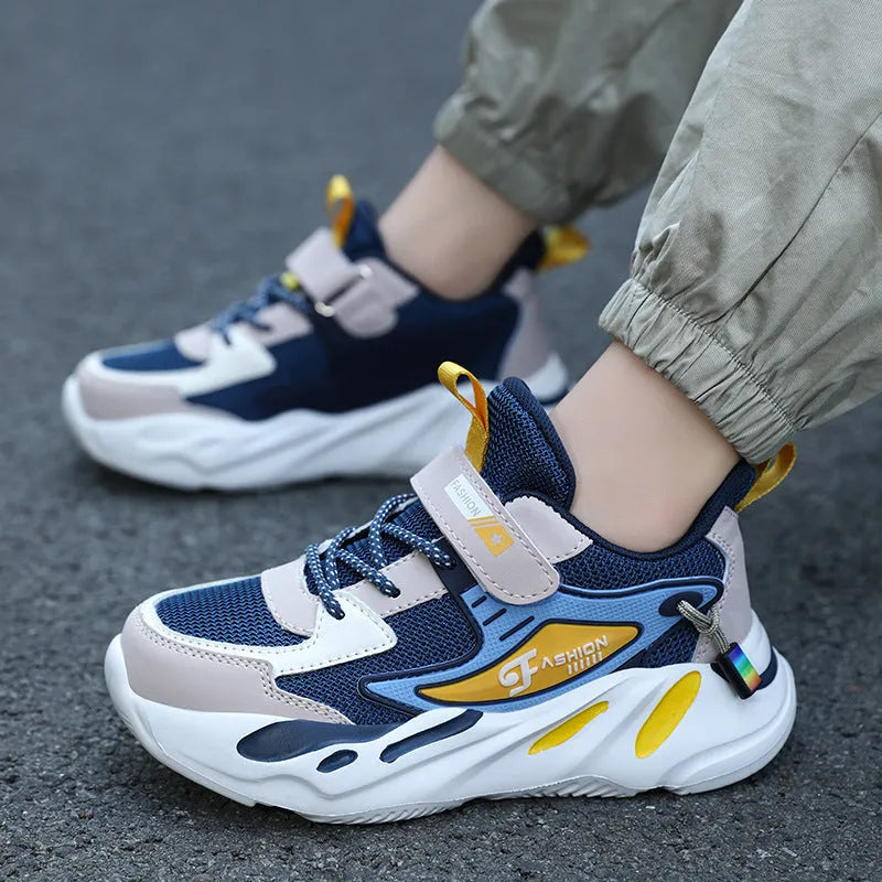 Boys' dark blue and black platform sports running shoes with Velcro strap and mesh upper.
