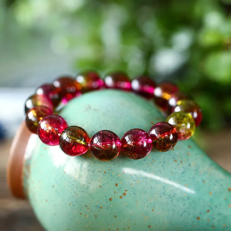 Handcrafted watermelon crystal bracelet for women showing different bead size options.