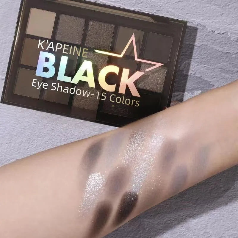 15-colour eye shadow palette showing grey, black, brown and blue shades for smoky makeup