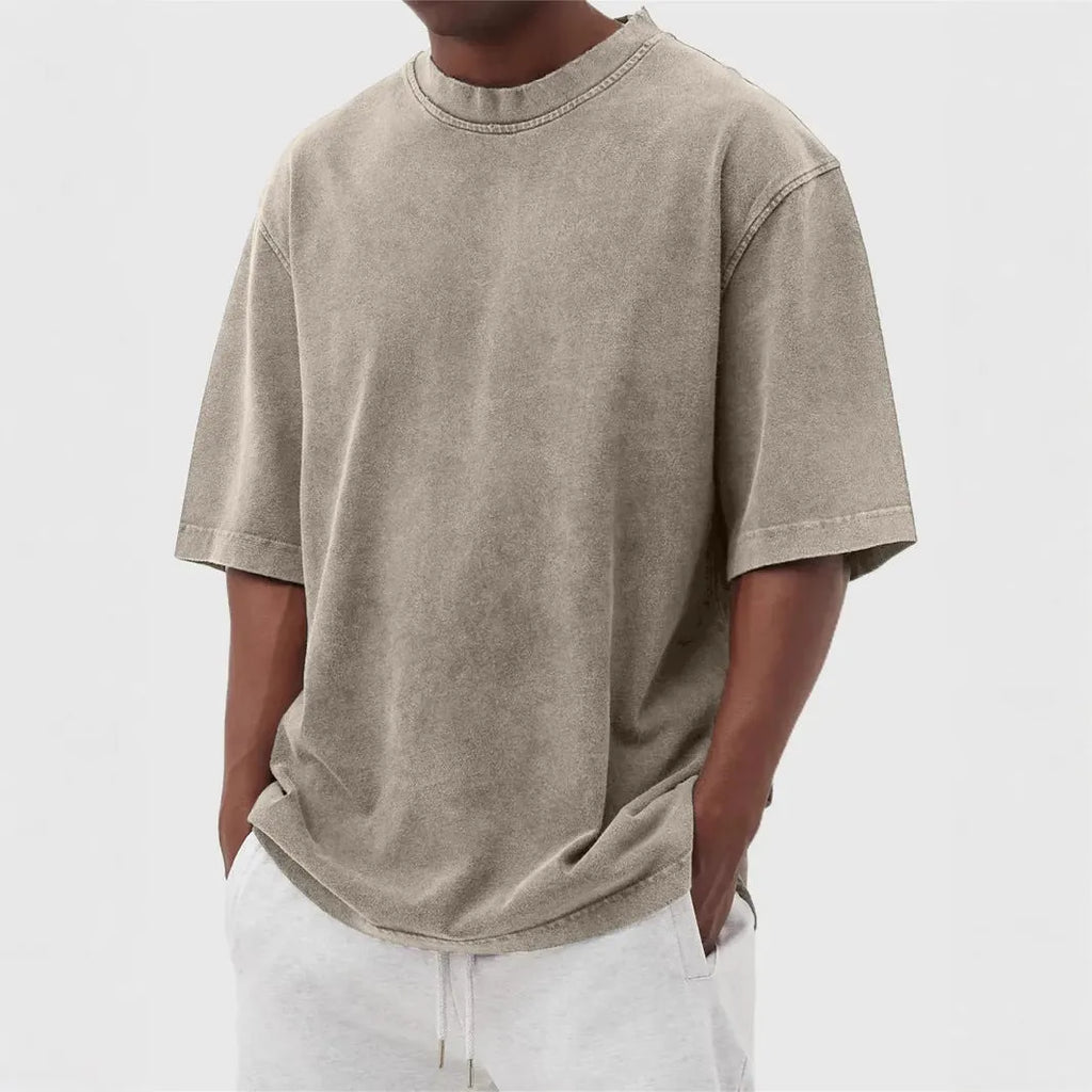 Men's loose fit distressed stone wash pullover t-shirt in solid colours like army green and blue.