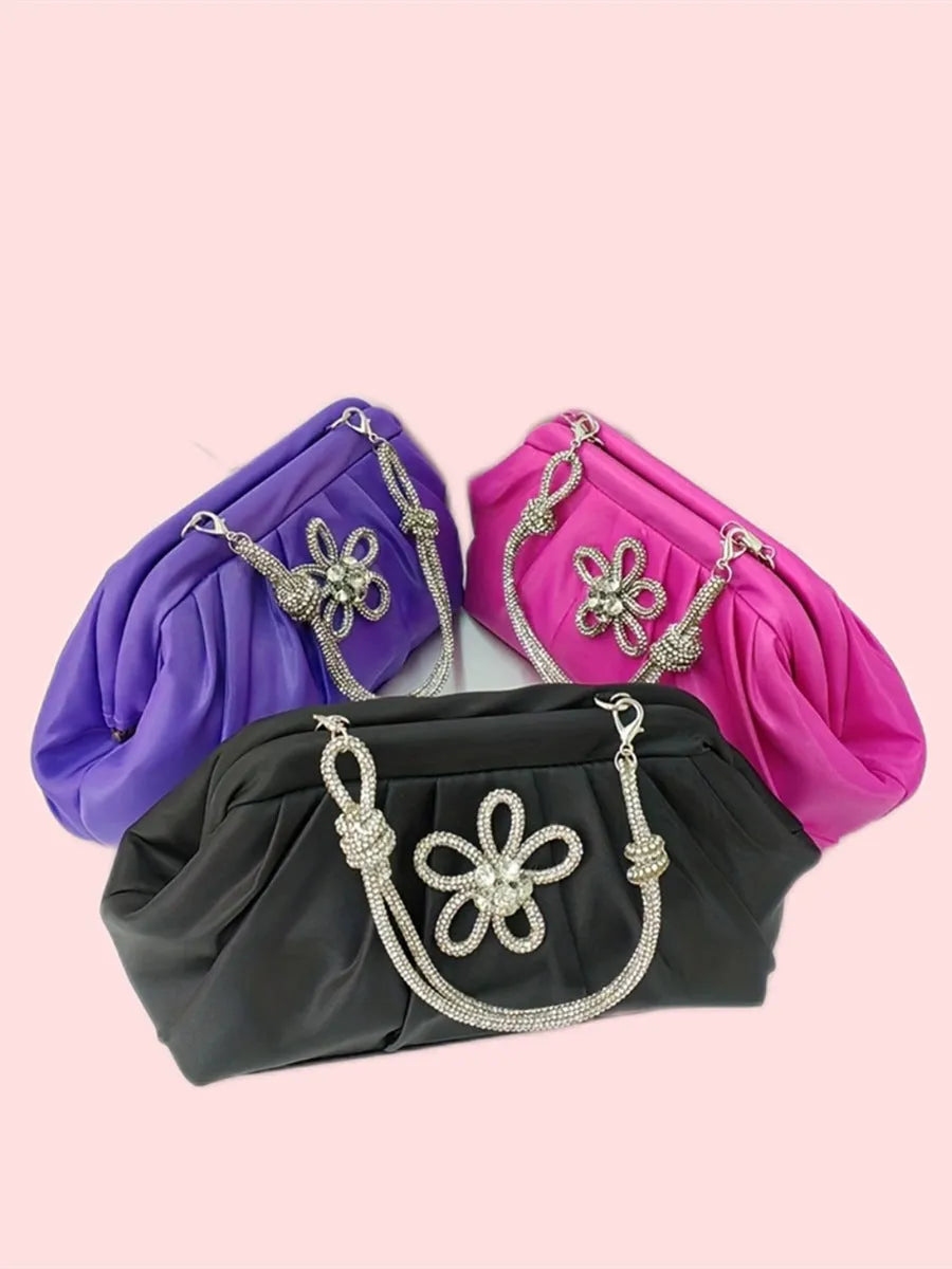 Soft shell-shaped women's large-capacity messenger bag in black, lavender purple, or rose red with fold and chain details.