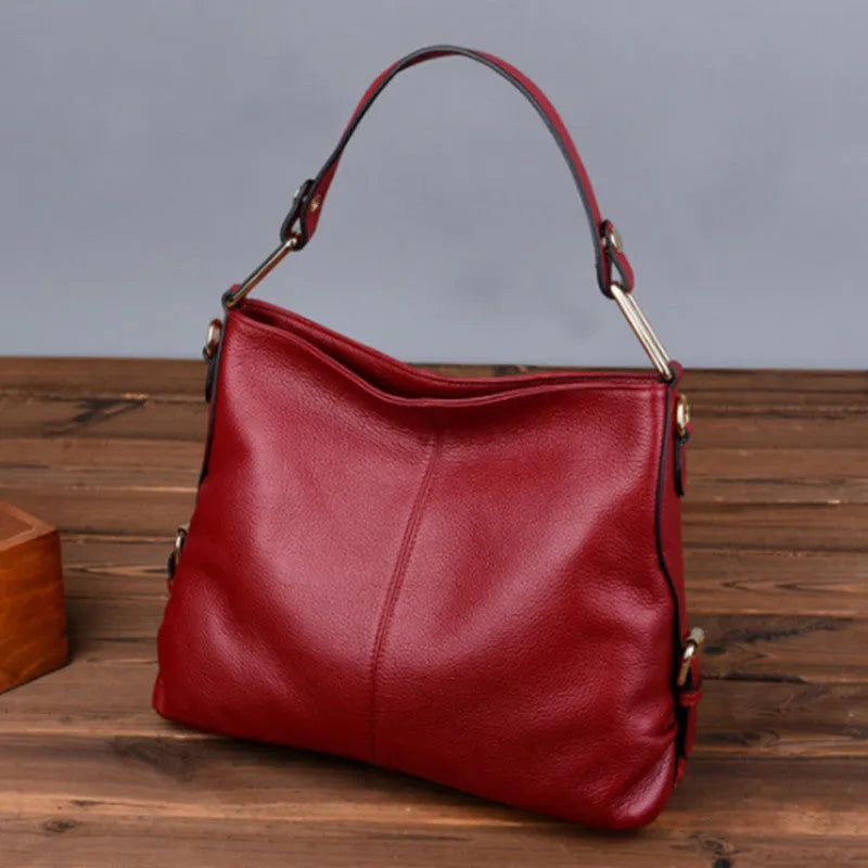 Genuine leather vertical square crossbody bag showing internal phone and document pockets