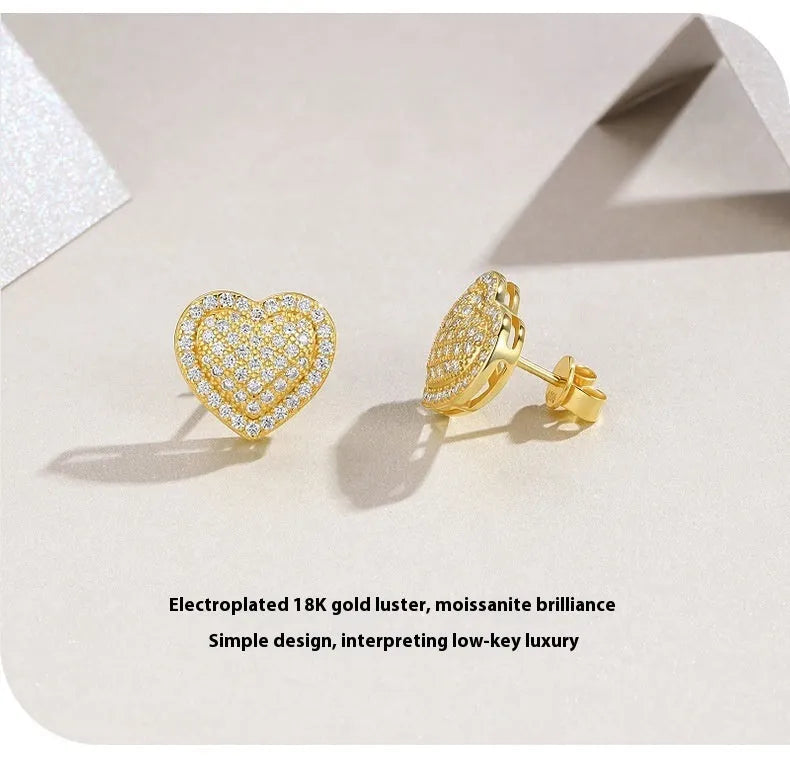 Gold colour S925 silver heart-shaped stud earrings with moissanite stones.