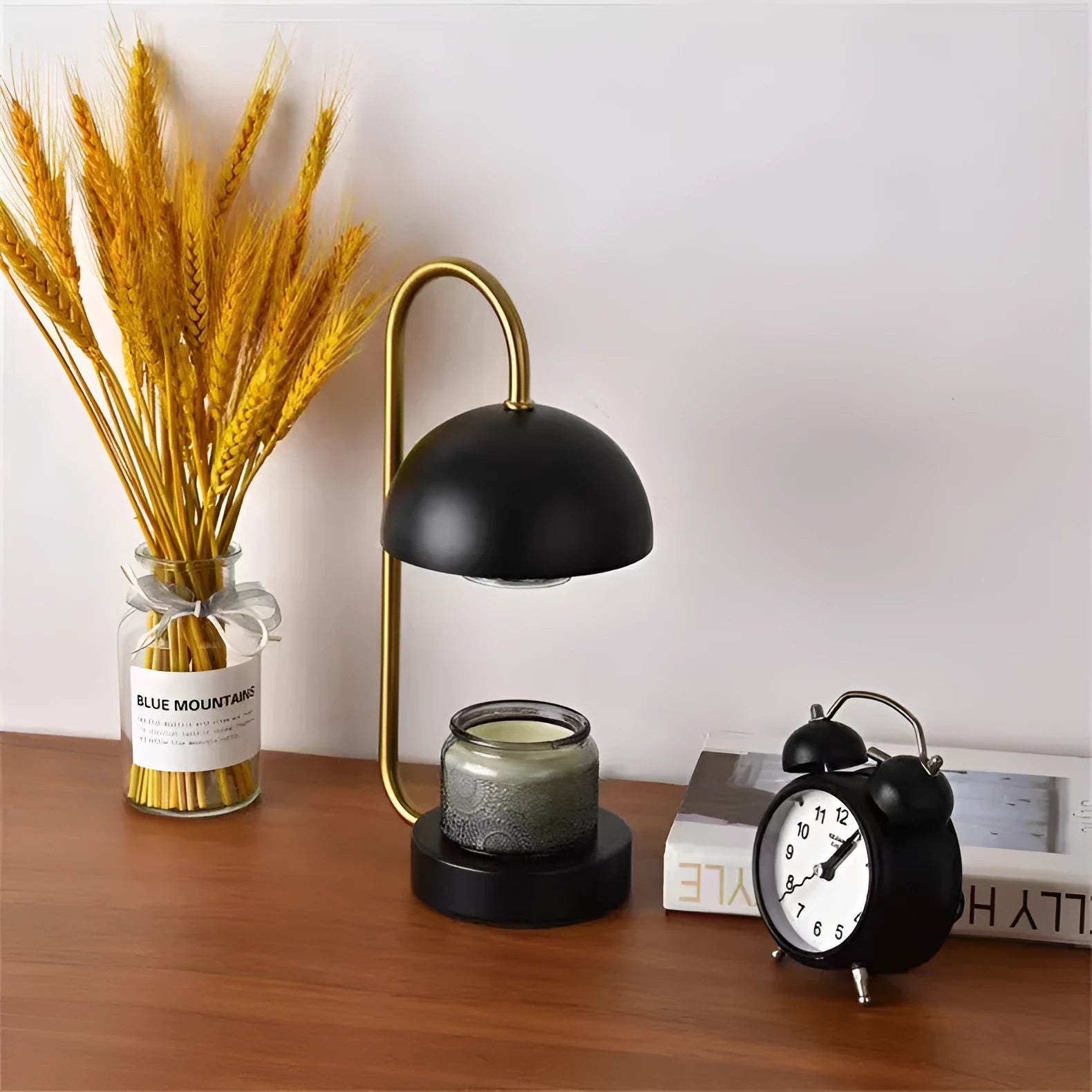 Solid wood aromatherapy wax melting lamp with dimmer knob on bedside table