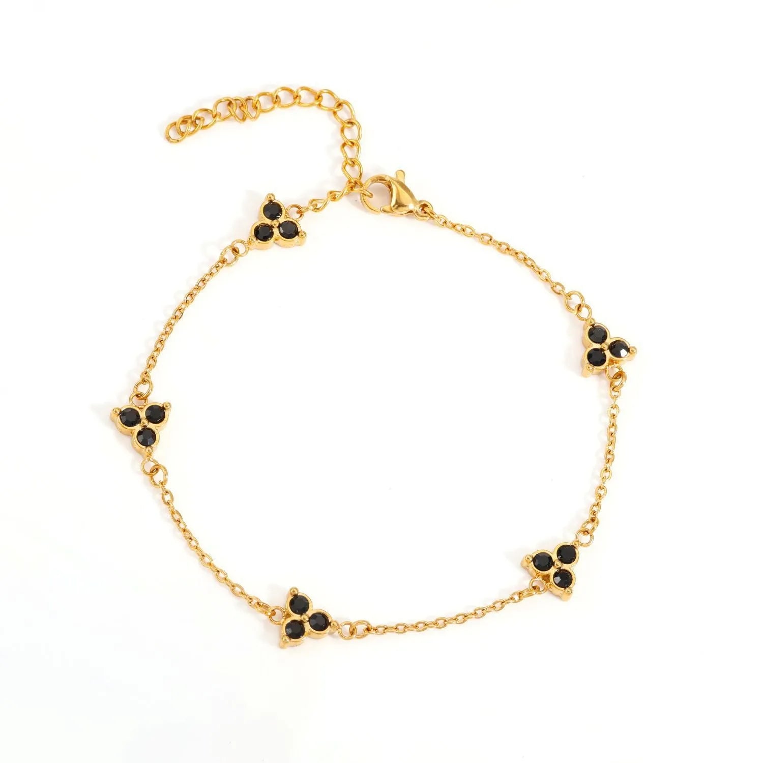 Women's stainless steel bracelet with a geometric triangle pendant, shown in gold and steel tone options with coloured stones.