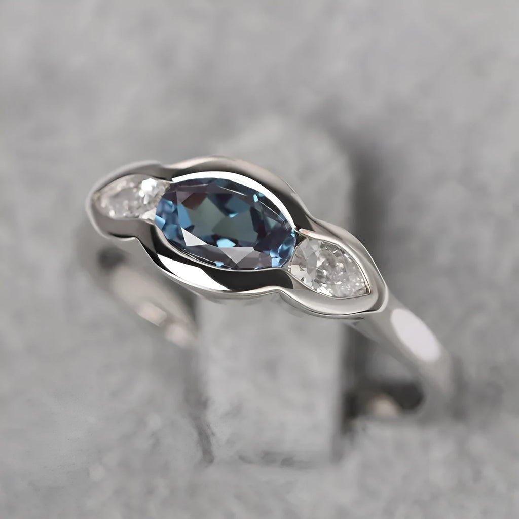 Geometric ellipse women's ring with inlaid zircon stones in Q941 white gold plating