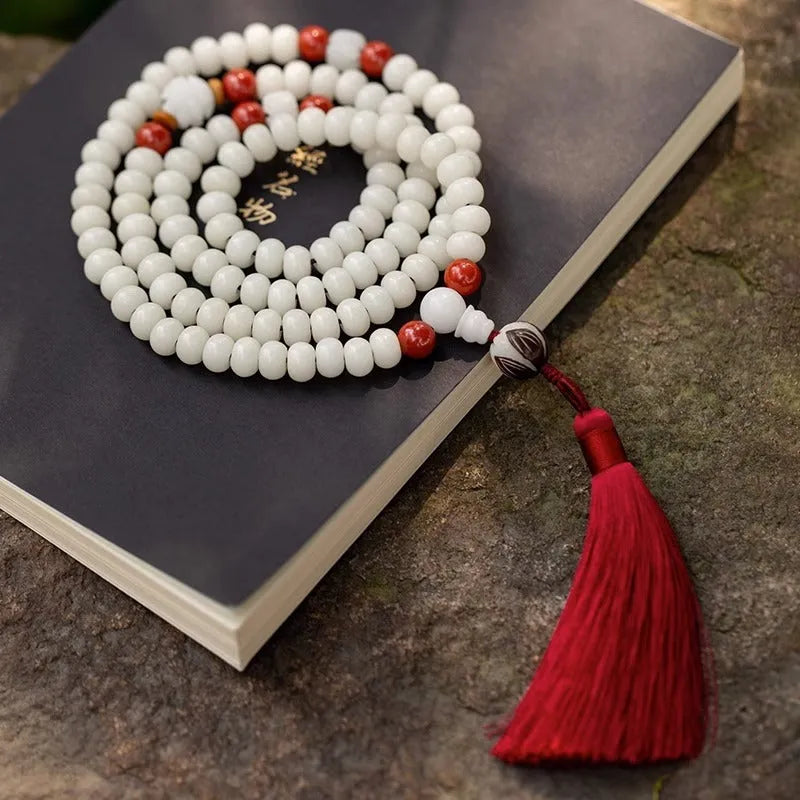 White jade Bodhi seed bracelet with 6x8mm beads showing multiple decorative style options