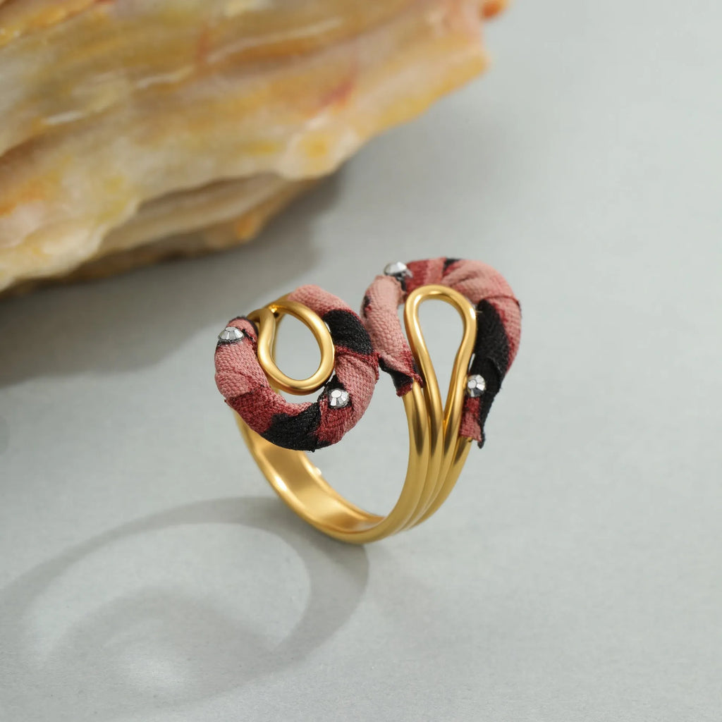 Stainless steel open mouth ring with leopard print and geometric designs including heart and star shapes