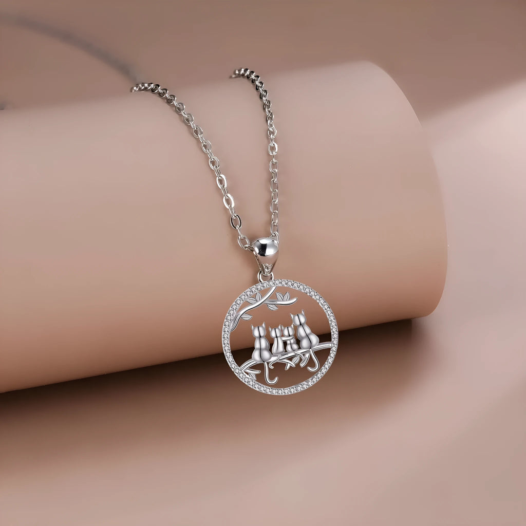 Copper necklace with four kitten pendant on cross chain, electroplated finish