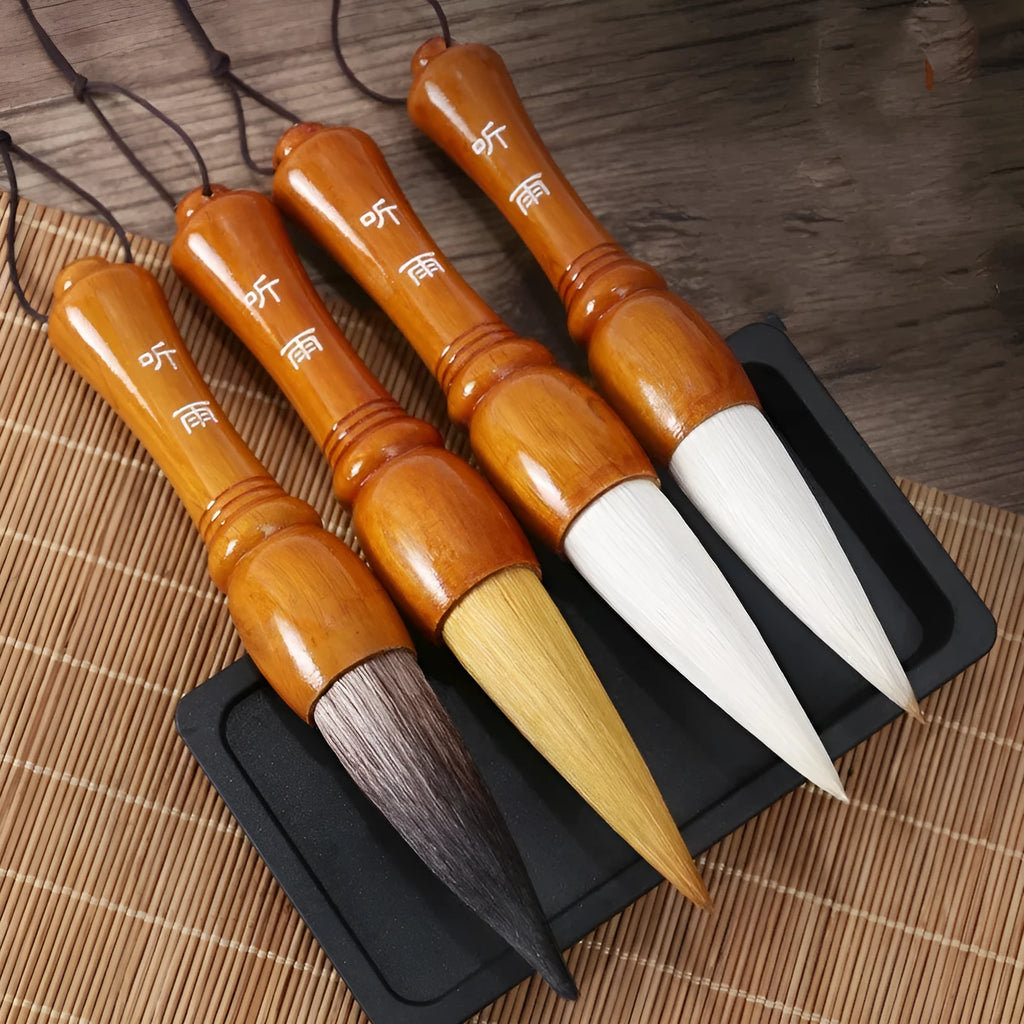 Large traditional Chinese wrist calligraphy brush with sheep hair nib on paper.