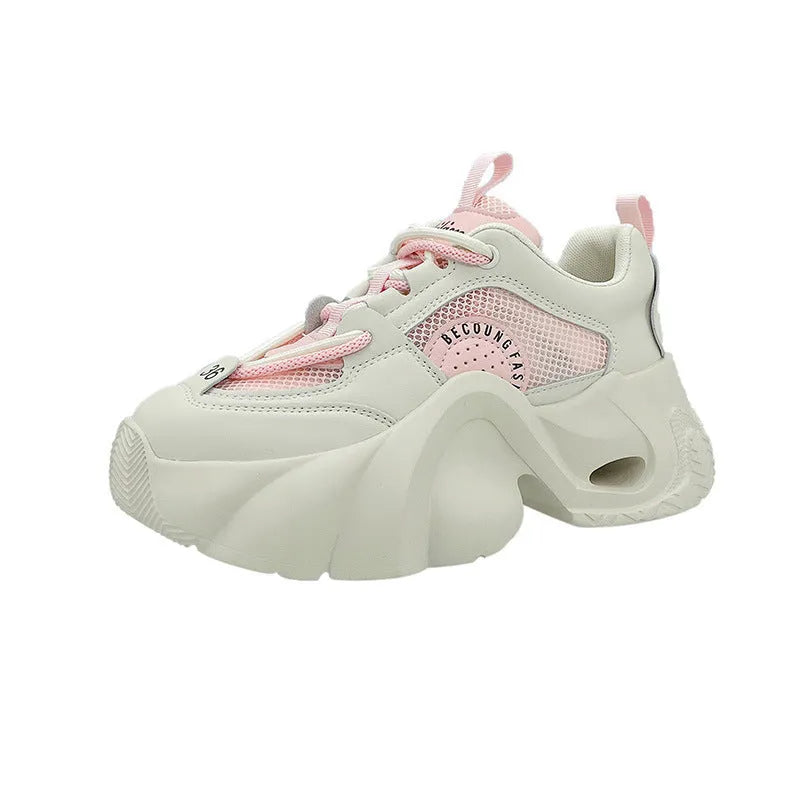 Women's beige sneakers with cross shoulder straps and a thick mid-heel sole