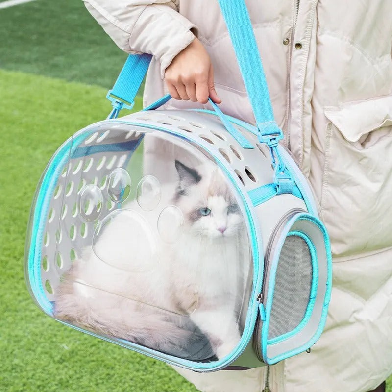 Transparent space capsule cat backpack carrier in grass green colour showing hard EVA construction and dimensions for cats up to 9kg