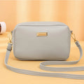 A square-shaped PU leather shoulder bag for women in an urban style, shown in multiple colour options.