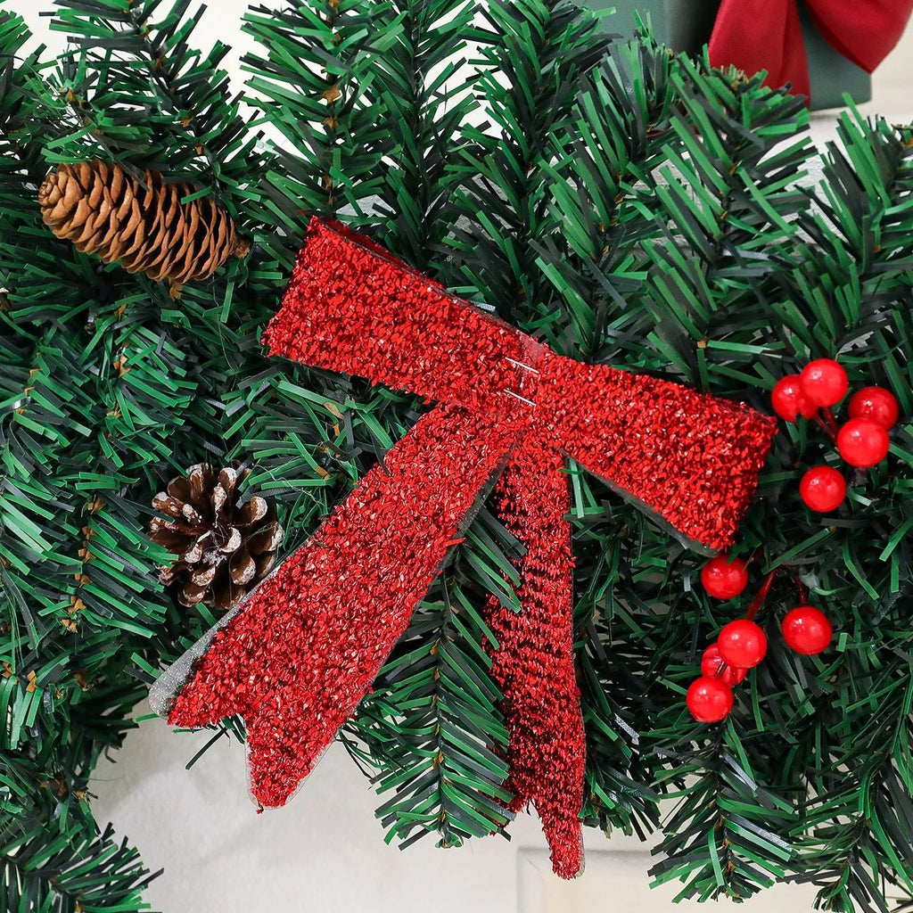 Christmas rattan decoration with PVC pine cone bow, available with optional LED lighting in warm white or coloured variants.