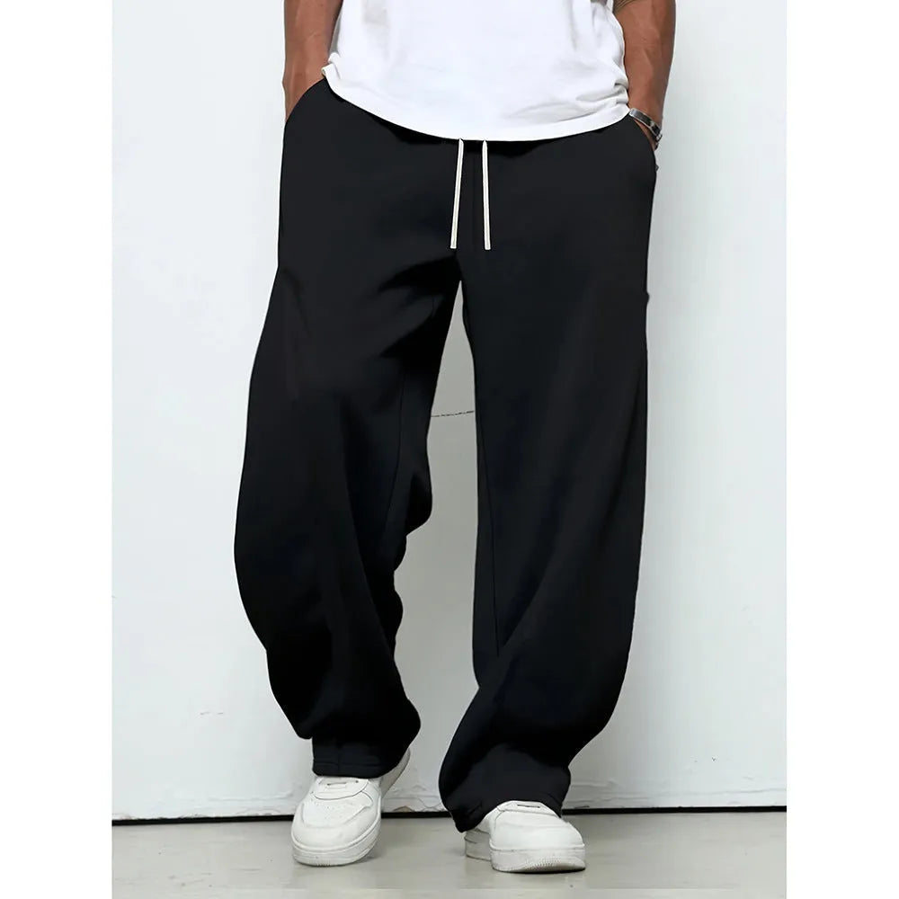 Men's solid colour casual trousers with an elastic waistband and straight leg in a grey shade.