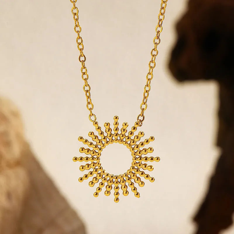 Sunflower Series women's gold-plated geometric chain necklace and bracelet set on a white background.