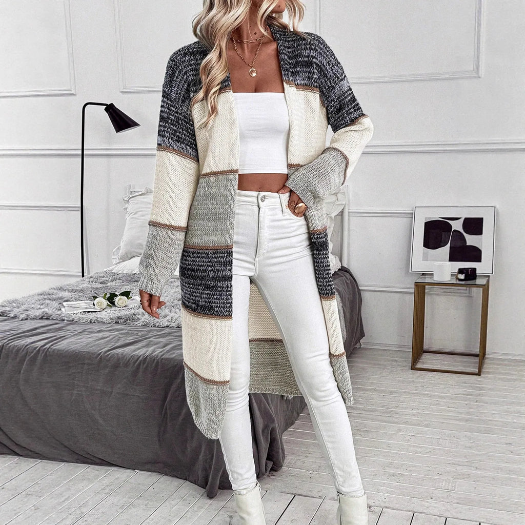 Grey women's knitted cardigan with striped or plaid pattern, loose fit with long sleeves