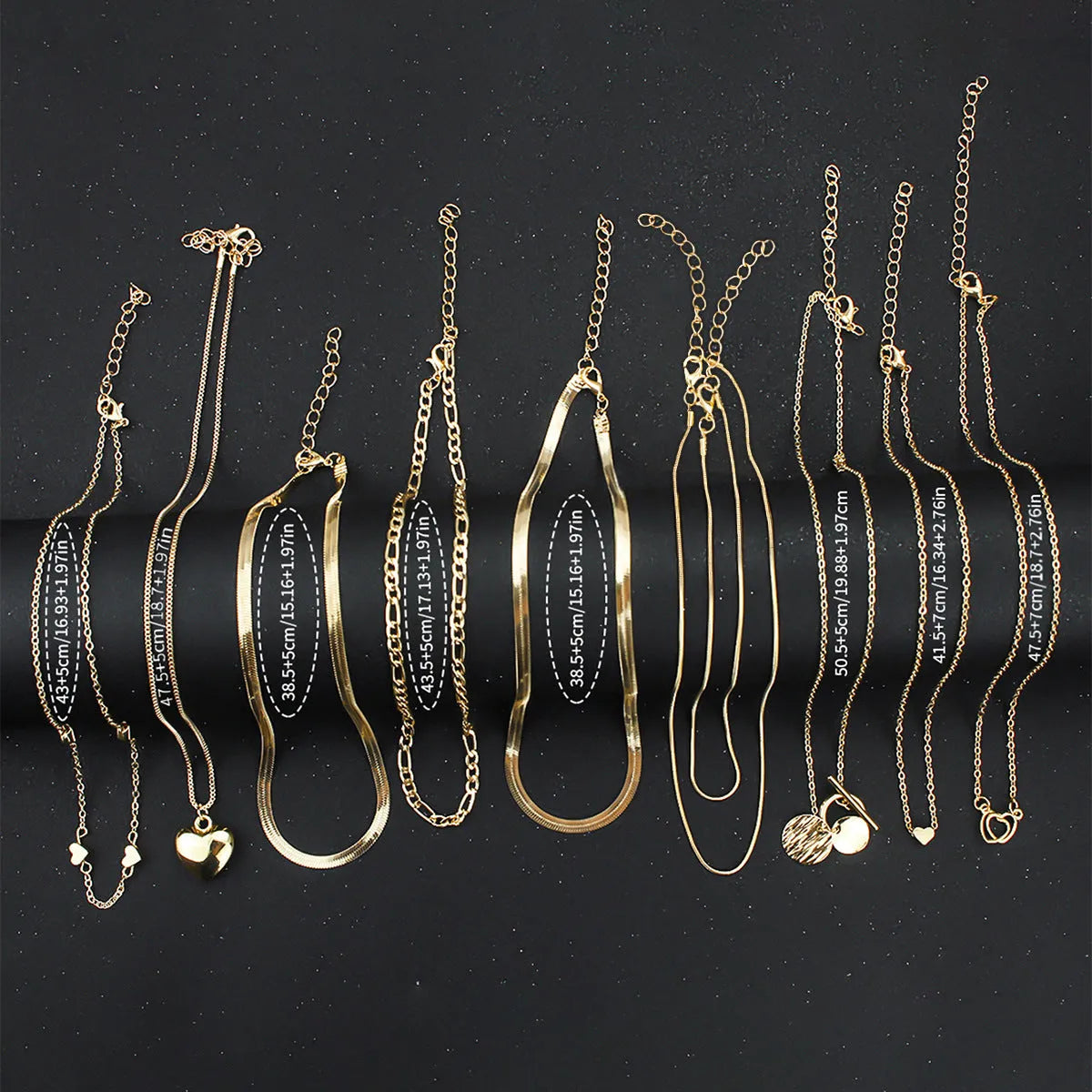 10-piece gold electroplated women's necklace set with adjustable length and snake bone chain design