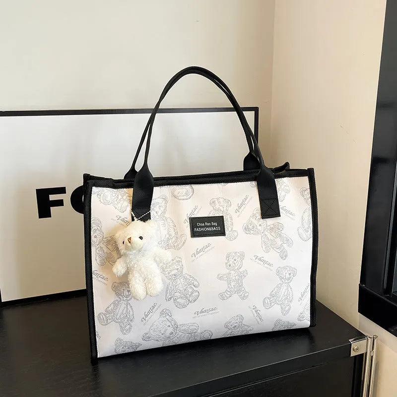 Women's black canvas tote bag with rhombus pattern print and large capacity design
