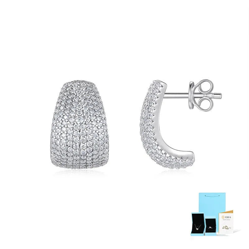 Geometric S925 sterling silver ear studs with moissanite centre on a white background.