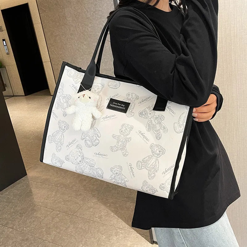 Women's black canvas tote bag with rhombus pattern print and large capacity design