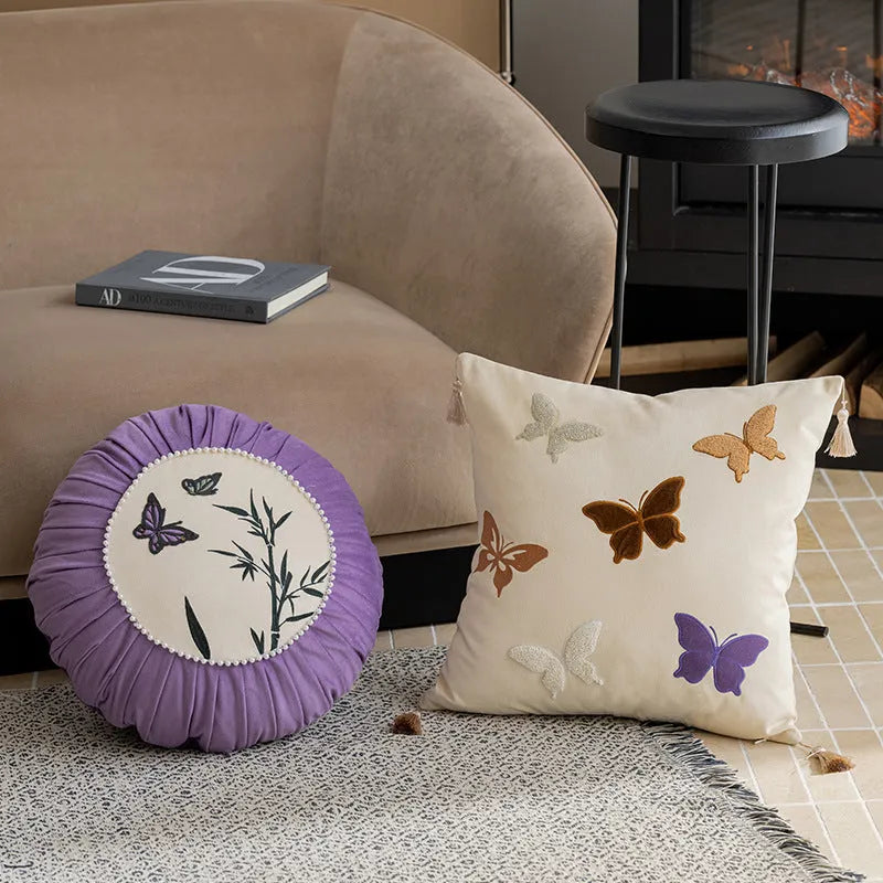 Square beige cushion with black and purple Chinese butterfly embroidery