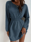 Blue women's knitted dress with crocheted flower detail and fitted waist