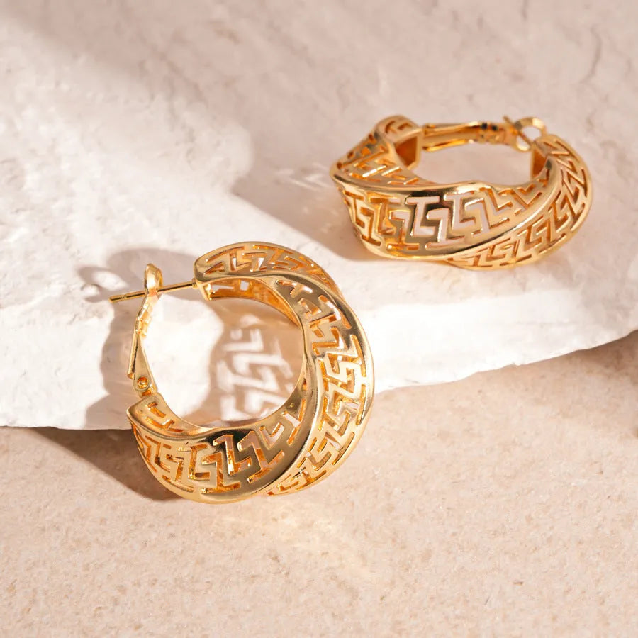 Women's geometric twisted round hollow stud earrings in silver needle-gold or silver needle-silver finish