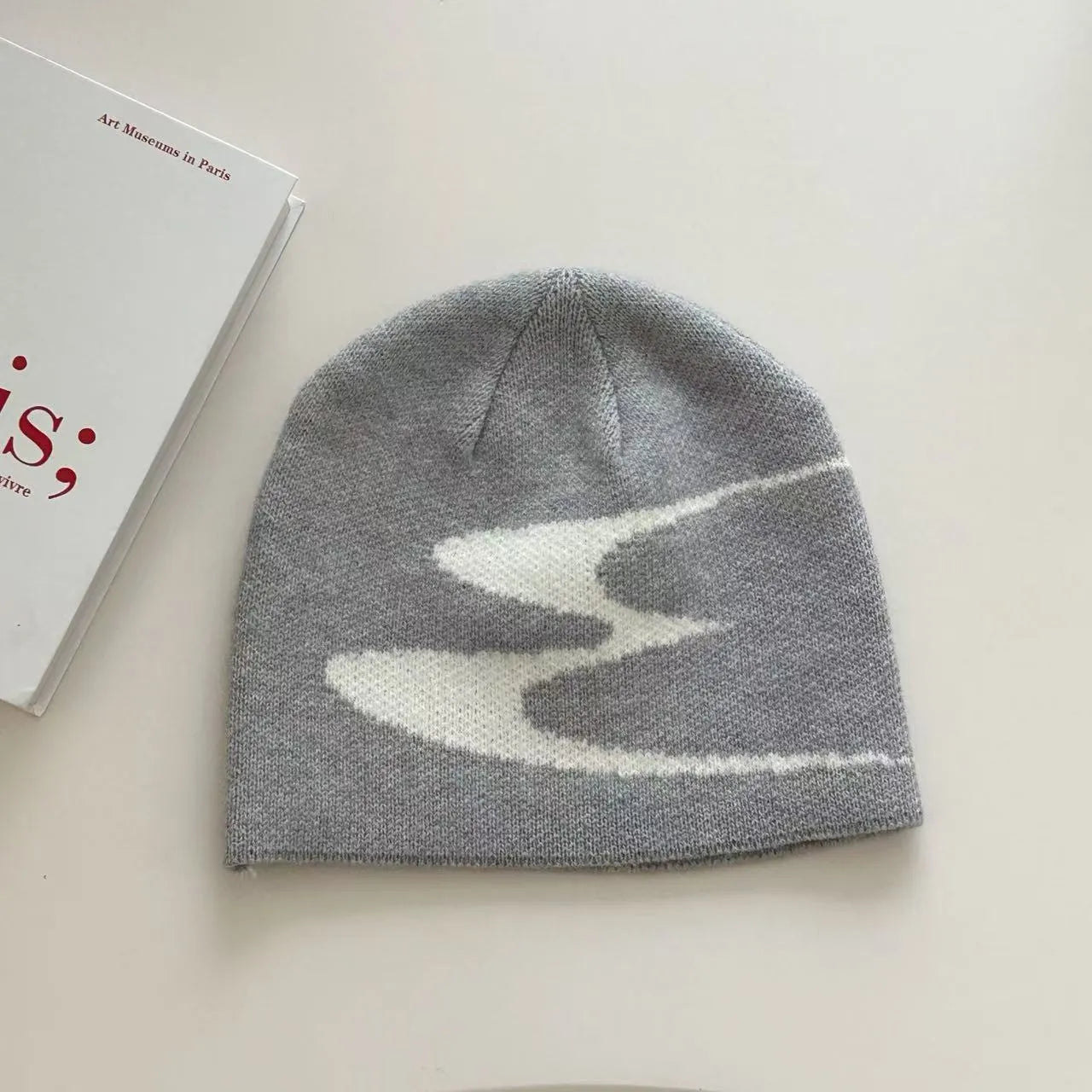 Acrylic thermal beanie hat in black, grey, or white colours for autumn and winter wear