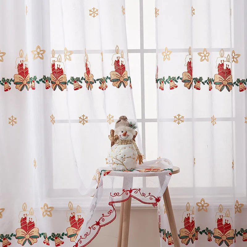 Pair of white Christmas curtains with red and green embroidered American-style snowflake design.