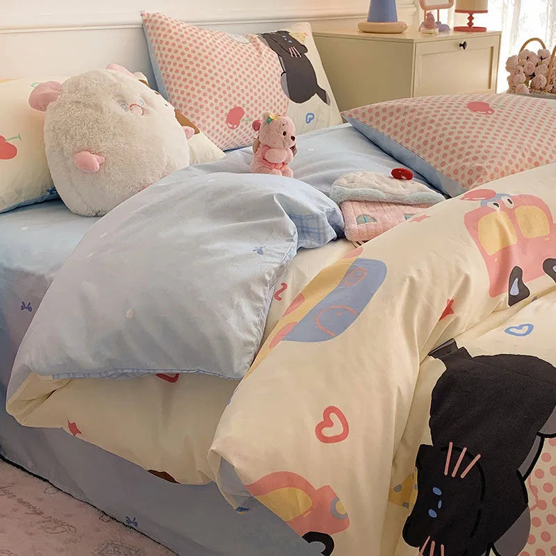 Cartoon dog pattern pure cotton quilt cover and pillowcases from a four-piece bedding set.