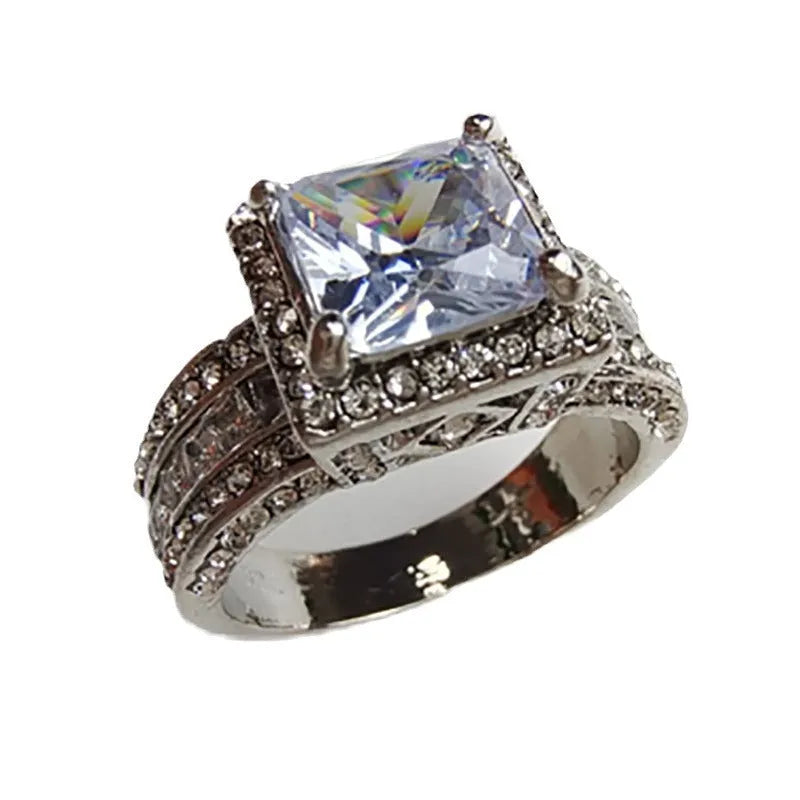 Geometric alloy fashion ring with round elements in gold or white electroplated finish