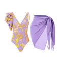 Women's solid colour one-piece swimsuit with spaghetti straps and a matching skirt.