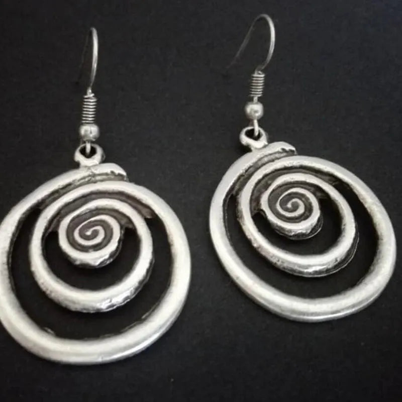 Silver geometric spiral distressed earrings with national style design measuring 2.6x5cm