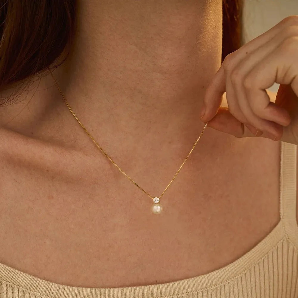 Women's stainless steel necklace with imitation pearl and zircon pendant in New Chinese style