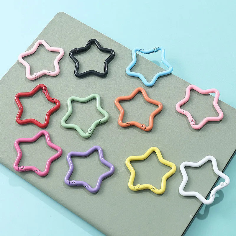Zinc alloy five-pointed star keychain in multiple colour options for backpack or key decoration