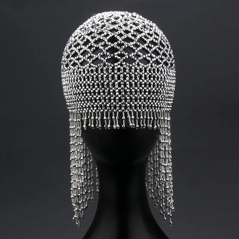 Handmade beaded belly dance headwear with alloy mesh and long tassel in silver.