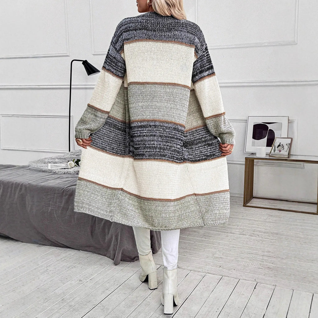 Grey women's knitted cardigan with striped or plaid pattern, loose fit with long sleeves