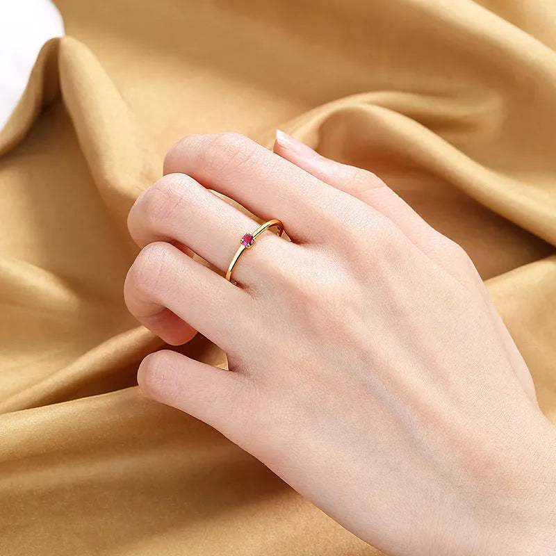 Women's personalised copper fine circle ring with single diamond geometric design in four colour options