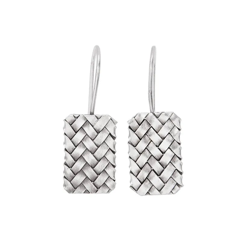 Silver geometric diamond-shaped earrings with a woven plaid pattern for women.