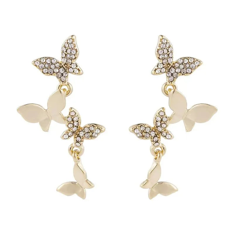 Women's gold-coloured copper butterfly earrings with four drop charms