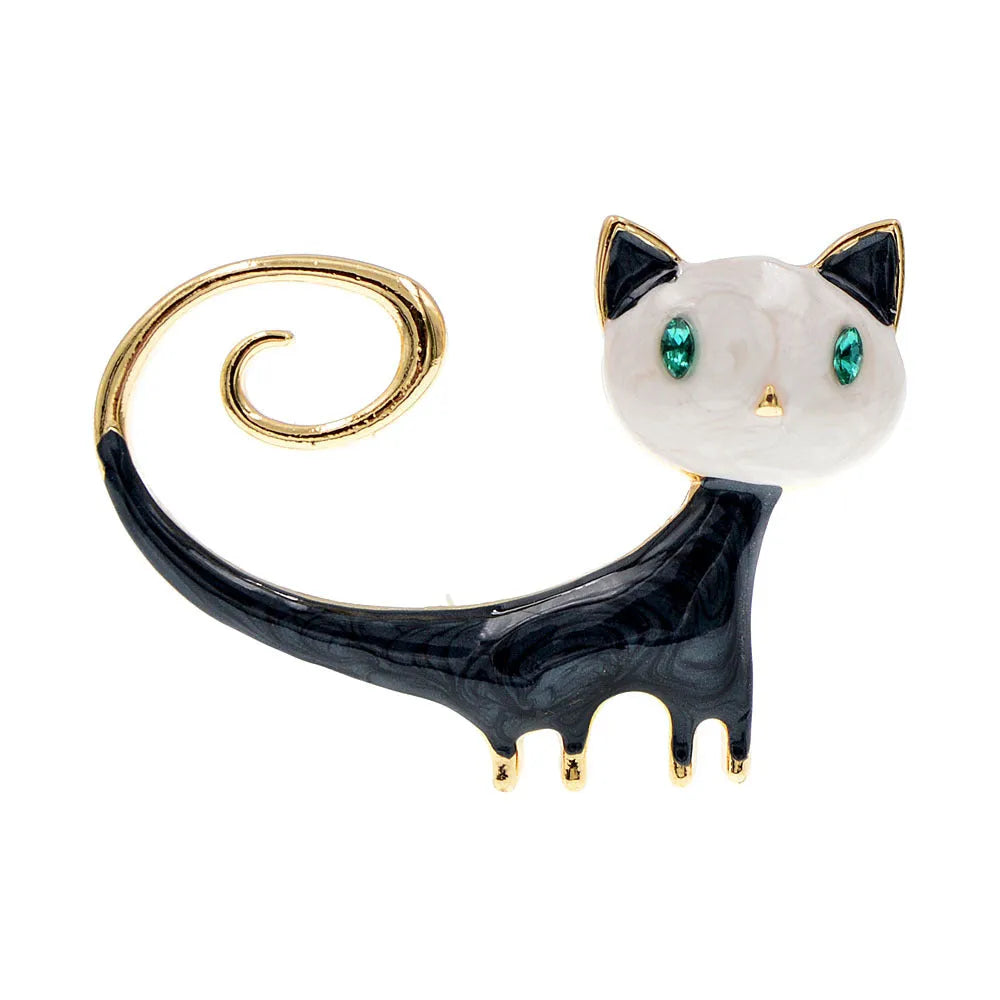 Personalised white and orange alloy cat brooch with painted detailing and a long tail.
