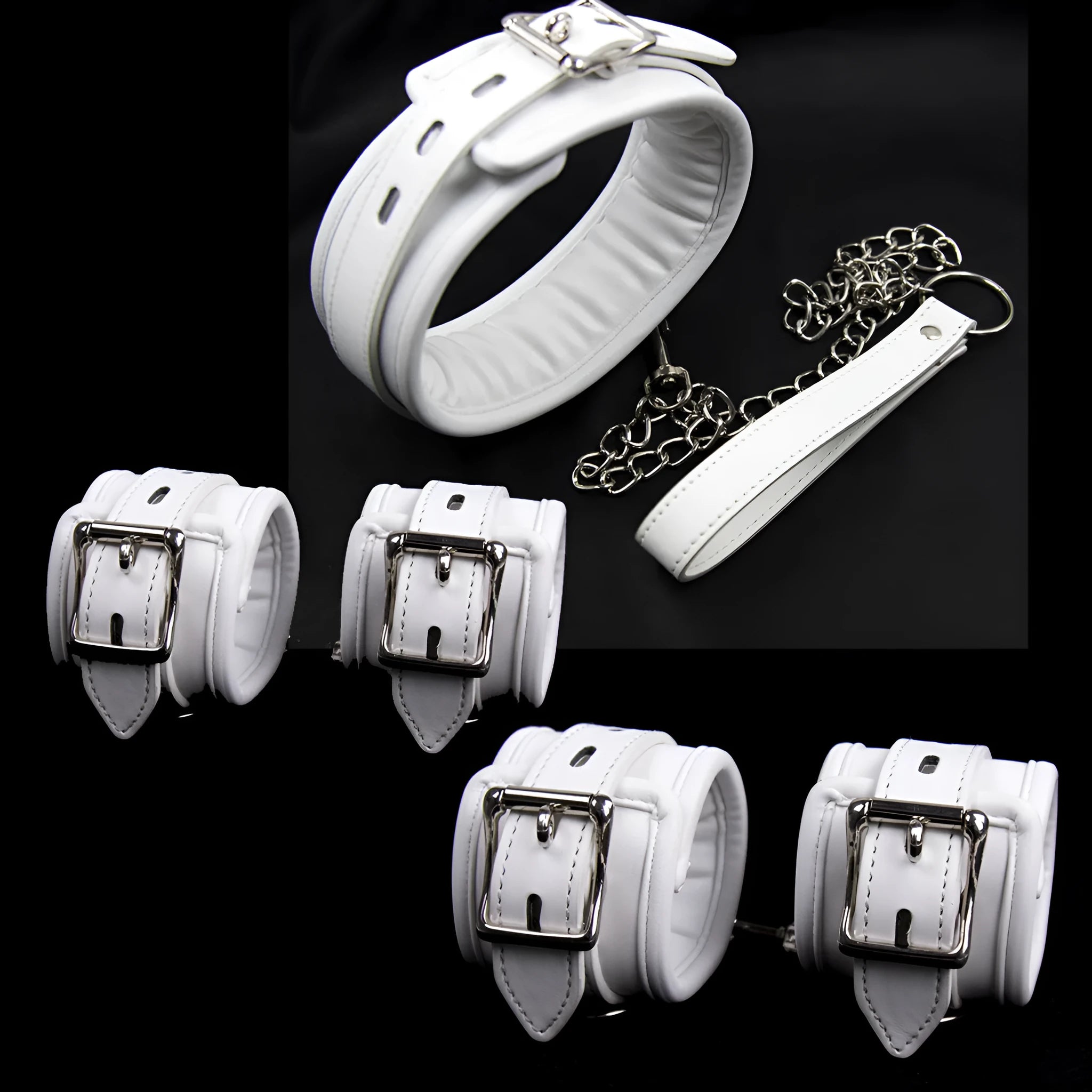 White PU sponge bondage restraint set showing handcuffs, foot cuffs, and neck scarf