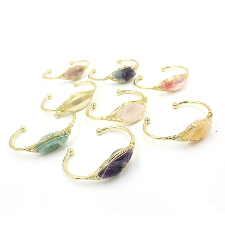 Natural raw gemstone bracelet with winding crystal design showing 8mm stones in various colours