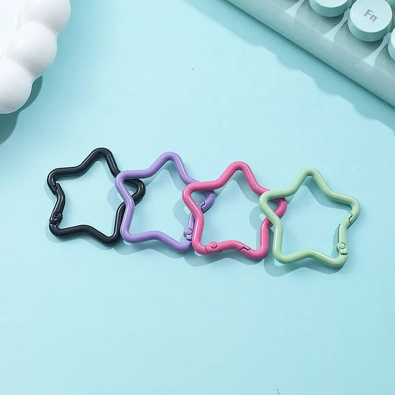 Zinc alloy five-pointed star keychain in multiple colour options for backpack or key decoration