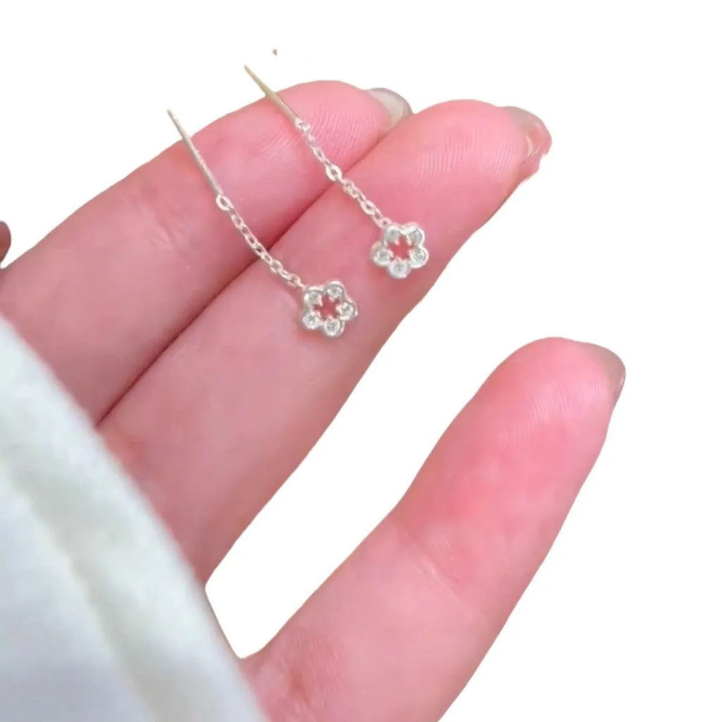 Sterling silver needle hollow flower hanging earrings with silver petal stud design